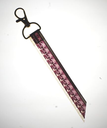 Daily Commute - 16mm film keychain